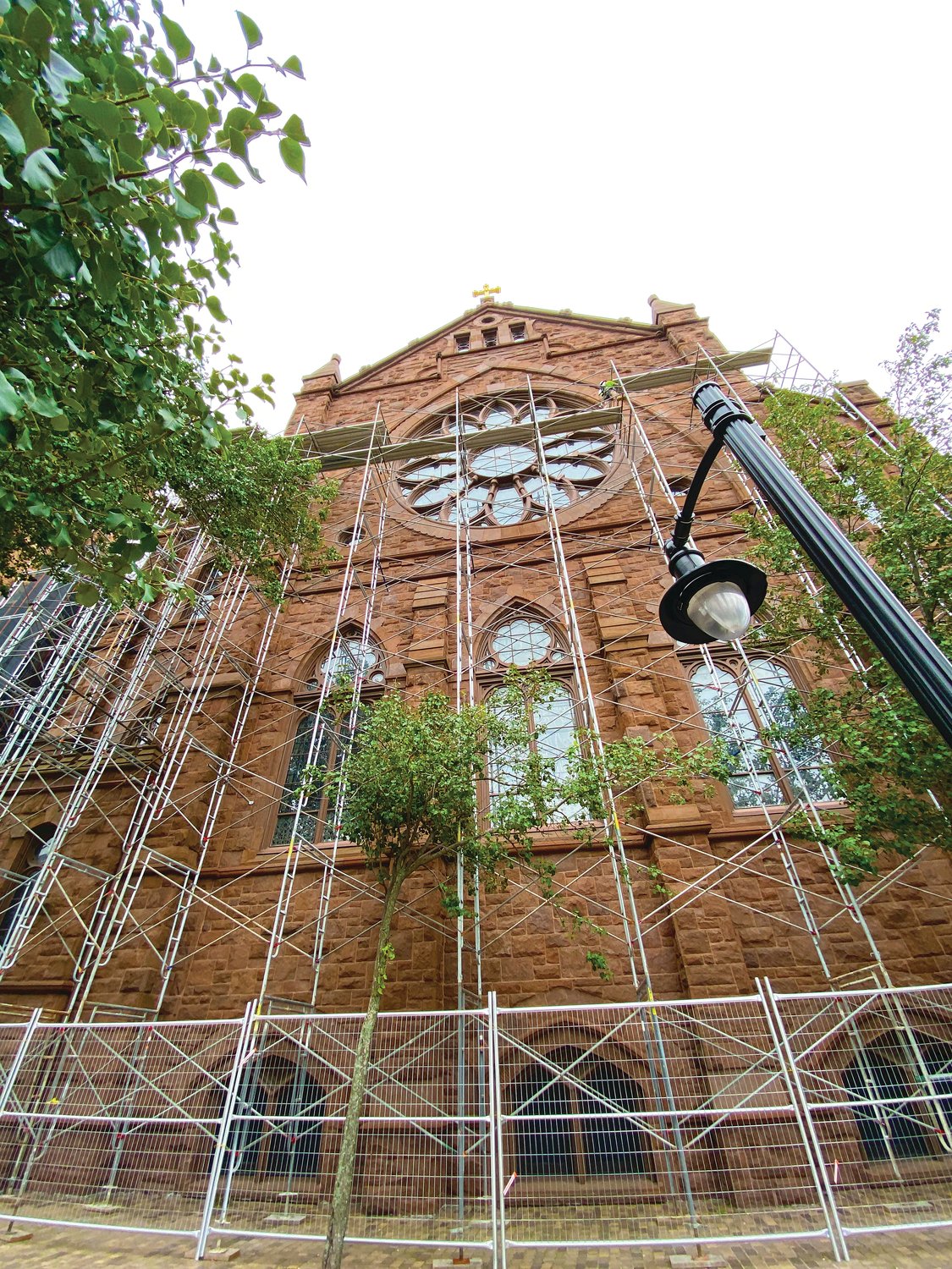 Staging begins around the Cathedral of SS. Peter in Paul in Providence as part of a 9-month-long project of significant renovations to the roof and other necessary projects around the perimeter of the historic building that was consecrated in 1889.